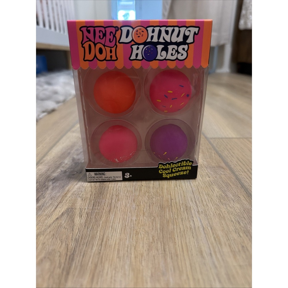Nee Doh Donut Holes Squeezable Stress Relief Toy Set Orange Pink Purple 4 Pack